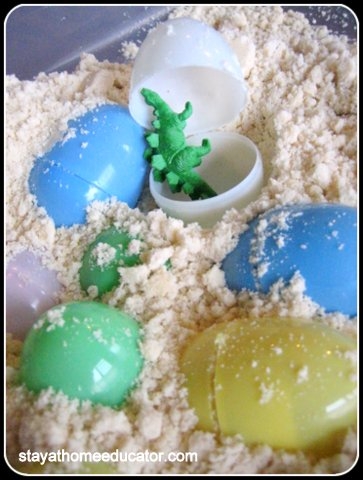 Hidden dinosaur in plastic egg for preschool activity