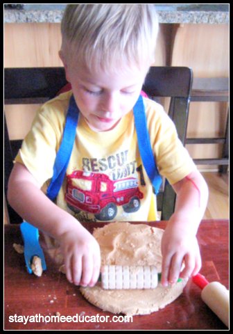 Preschooler playing with edible play dough