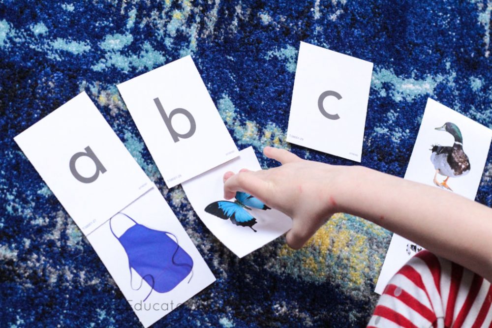 Alphabet activities matching letter and photo cards