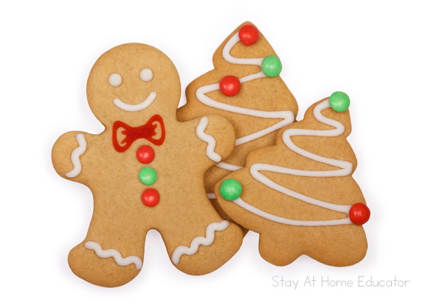 edible gingerbread playdough recipe |  gingerbread scented playdough cut out with cookie cutters, a gingerbread man, Christmas tree, stocking and candy cane | bakes gingerbread playdough recipe into cookies