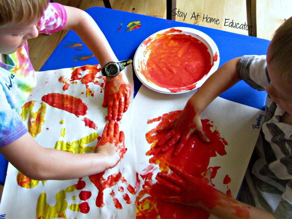 exploring how primary colors make secondary colors in color theory lessons in preschool - Stay At Home Educator