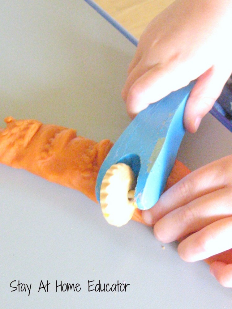 playing with play dough is an excellent fine motor activity - Stay At Home Educator