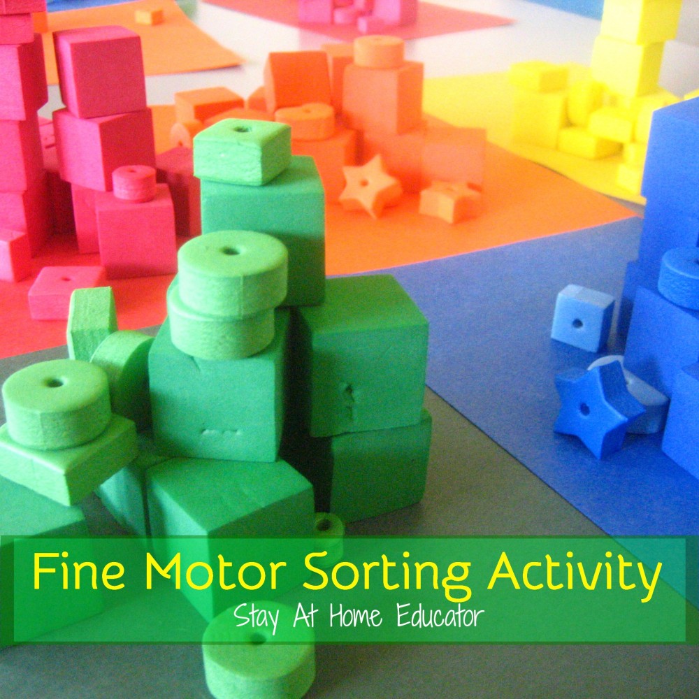 Stacking foam pieces with tweezers as a fine motor color sorting activity - Stay At Home Educator