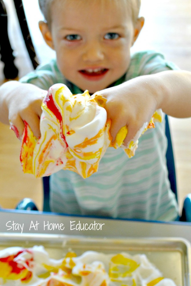 Making art with shaving cream and paint, part of exploring the sense of touch in five senses theme - Stay At Home Educator