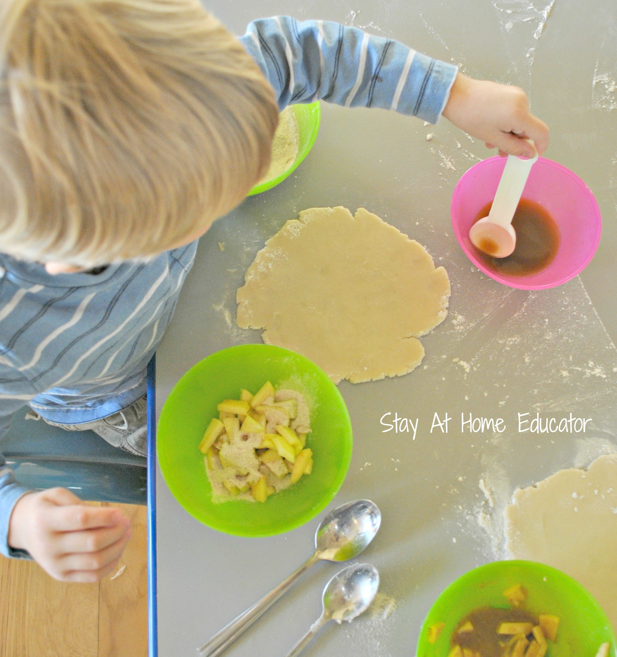 Preschooler making free form apple pie in harvest party - Stay At Home Educator