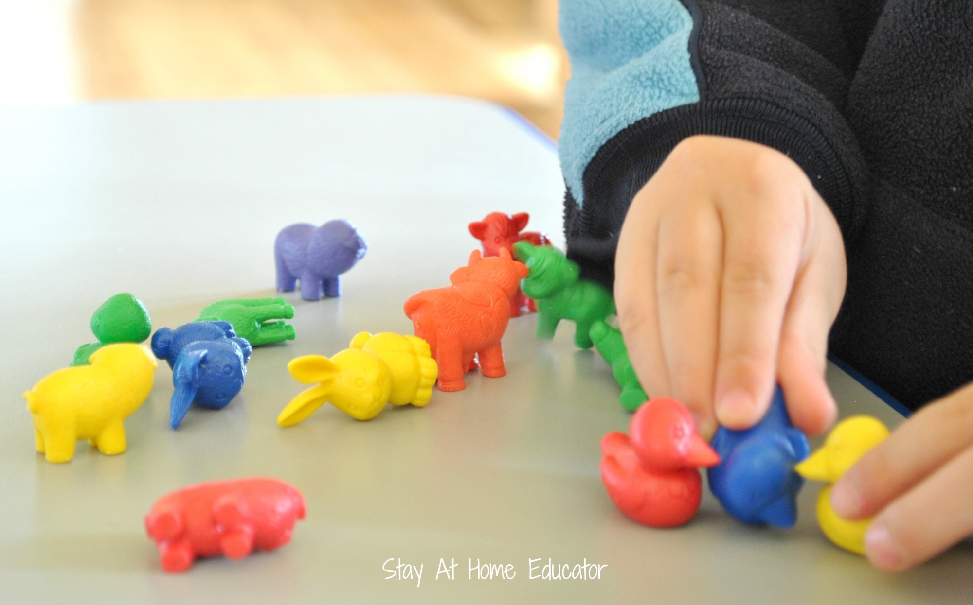 Free play with farm animal counters in preschool class - Stay At Home Educator