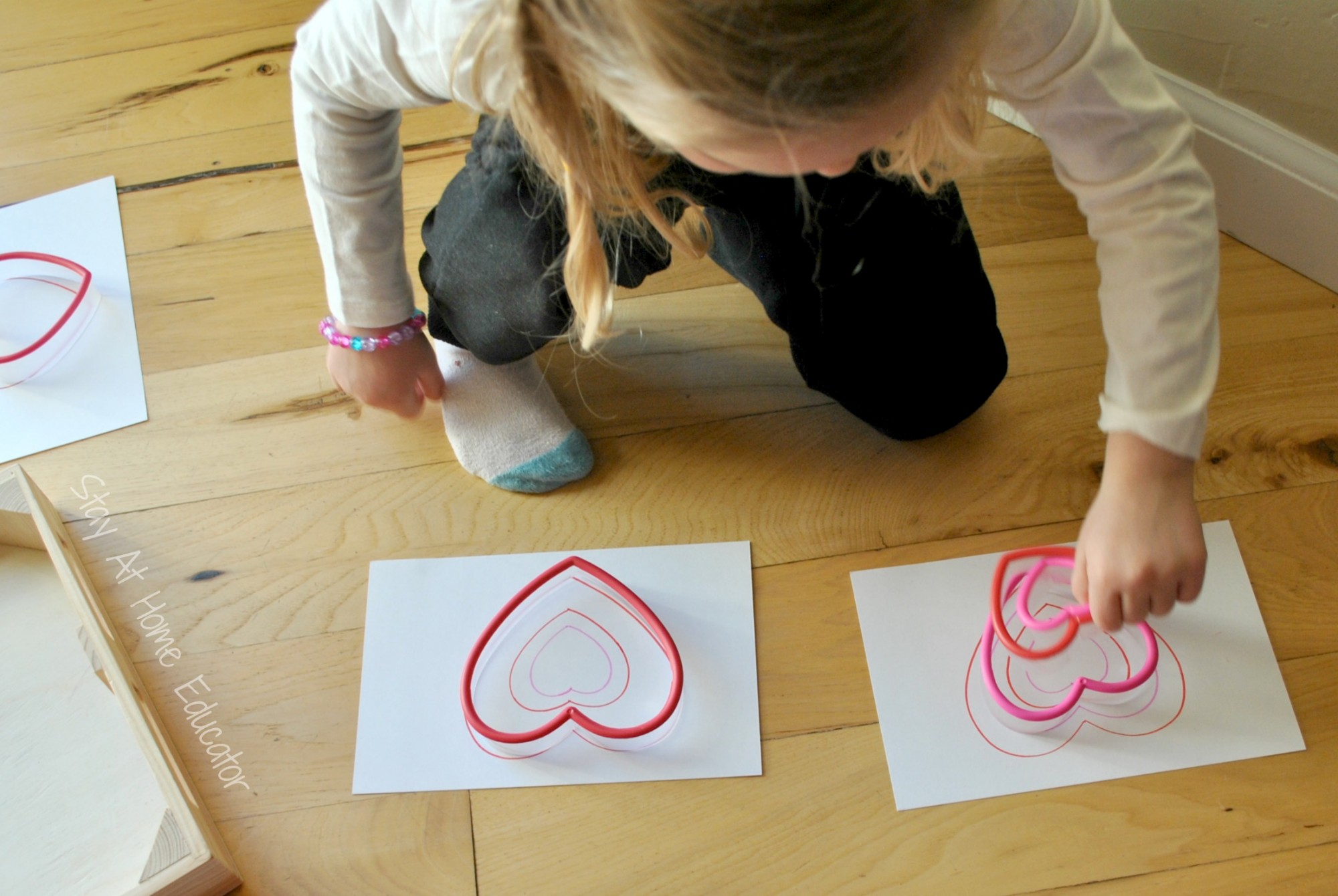 Child Using Heart Cookie Cutters in a Measurement Activity for Preschoolers