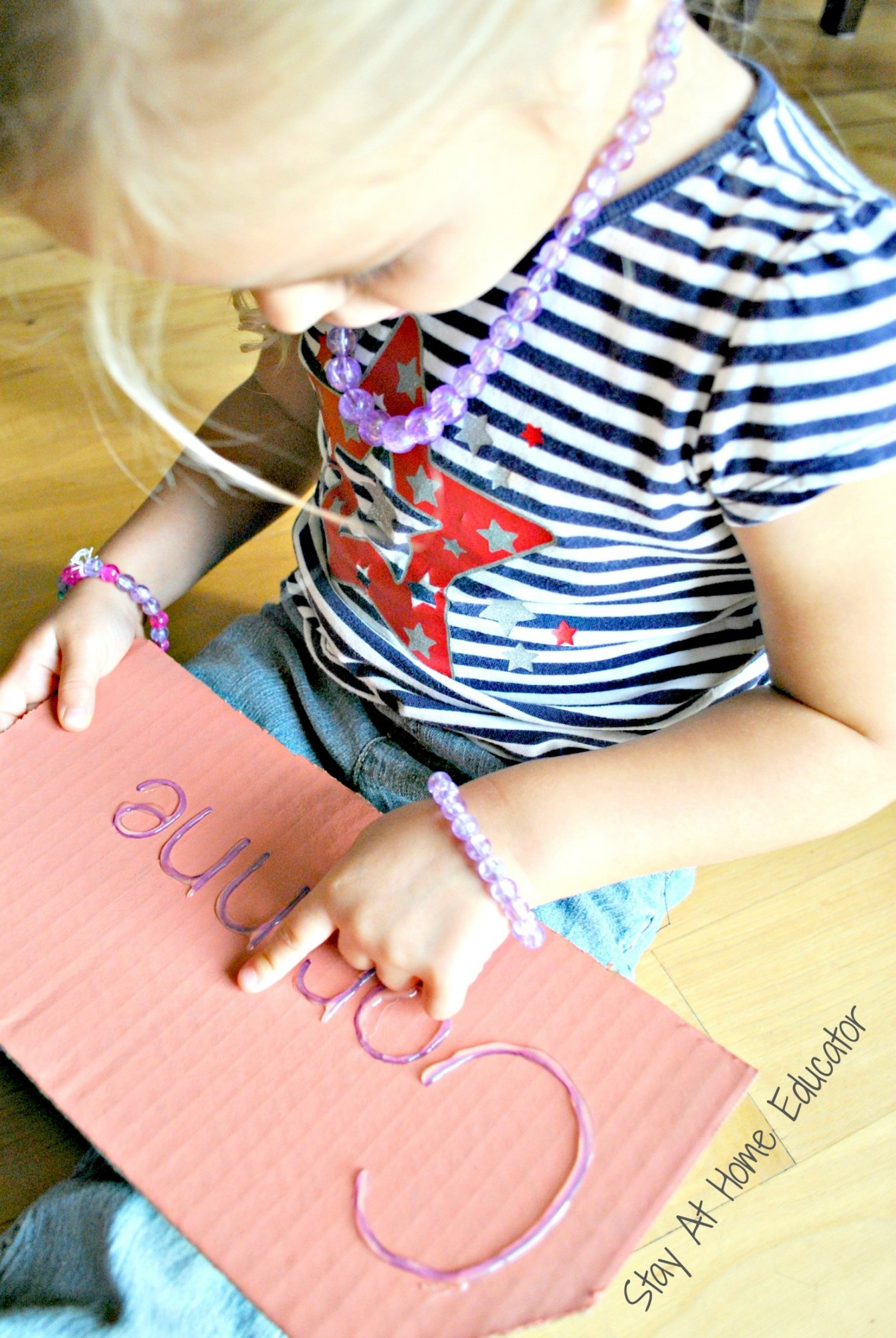 name writing activities | writing names with glue activity for preschoolers | tactile name tracing activities | how to teach preschoolers to write their names | collage of preschool name plates using hot glue for tracing the name with finger