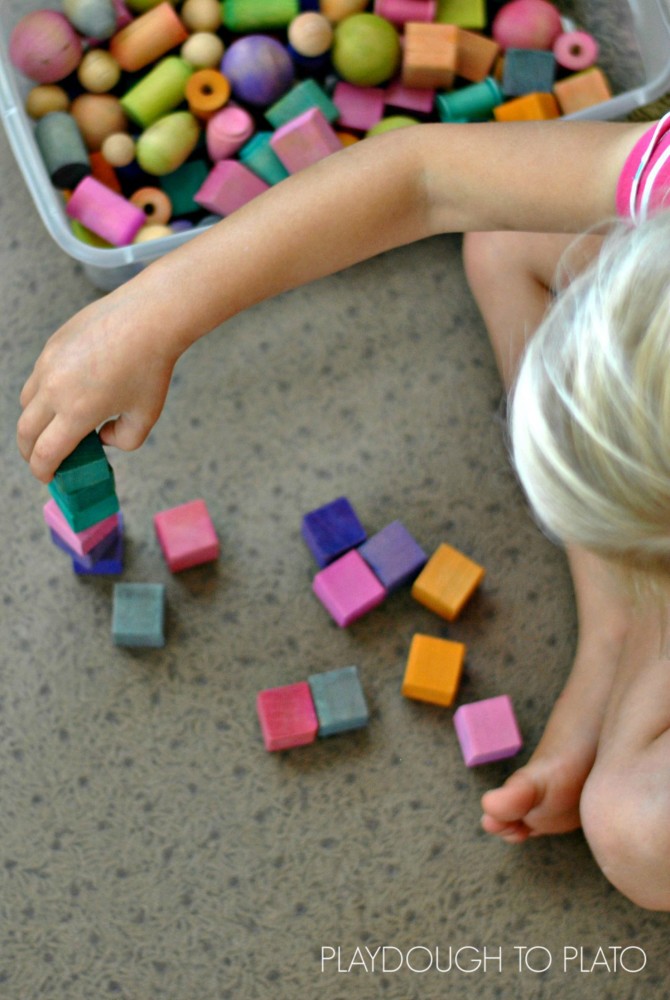the stages of block play and why it is important for fine motor development - Playdough to Plato.3