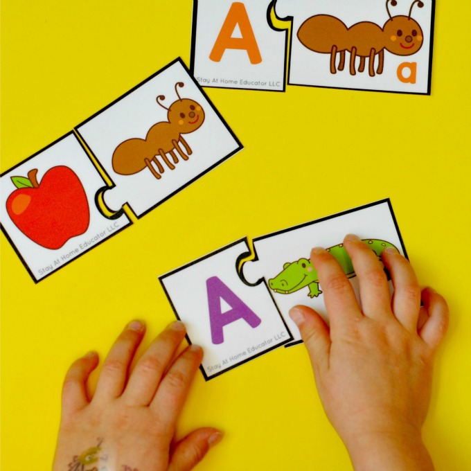 Preschool Phonics Centers - Letter matching and beginning sound puzzles.
