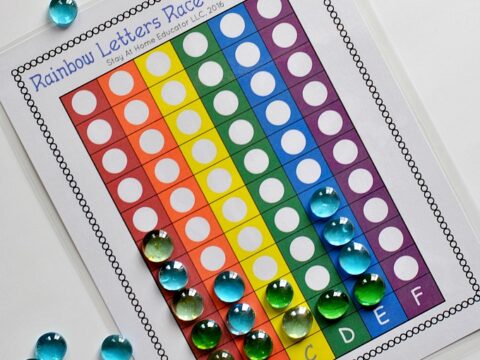 rainbow graph with letters A, B, C, D, E, F and blue gems to add to the graph after each letter is rolled | letter identification activities for preschool |