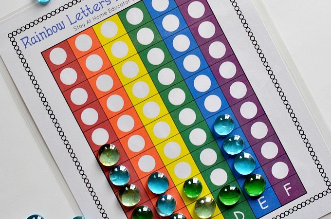 rainbow graph with letters A, B, C, D, E, F and blue gems to add to the graph after each letter is rolled | letter identification activities for preschool |