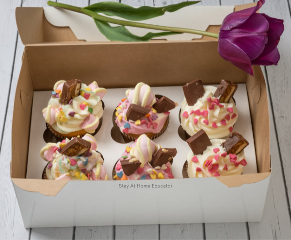 six cupcakes in a box with a rose on top as an example of subitizing