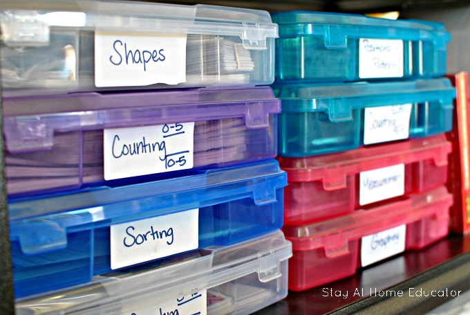 Use scrapbooking bins to store manipulatives for preschool math lesson plans.