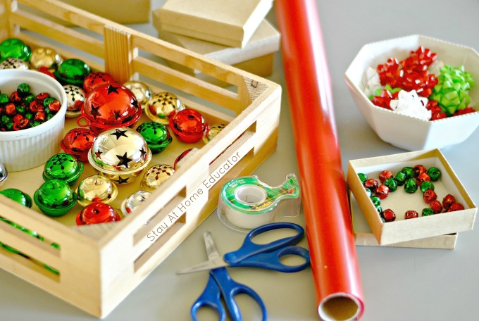 Christmas gift wrapping center for fine motor practice - Stay At Home Educator