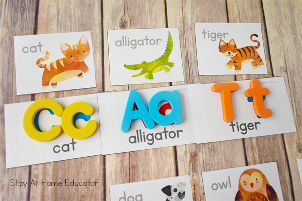 engaging alphabet activities for preschoolers using alphabet magnets and beginning sound puzzles