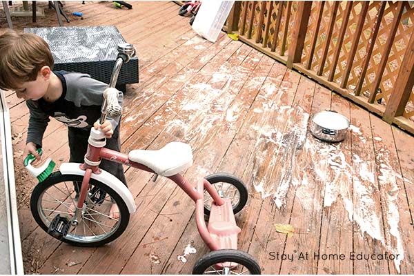 chores for preschoolers - washing a tricycle