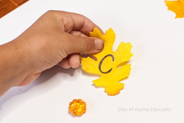 Fall alphabet activities that work on location words too