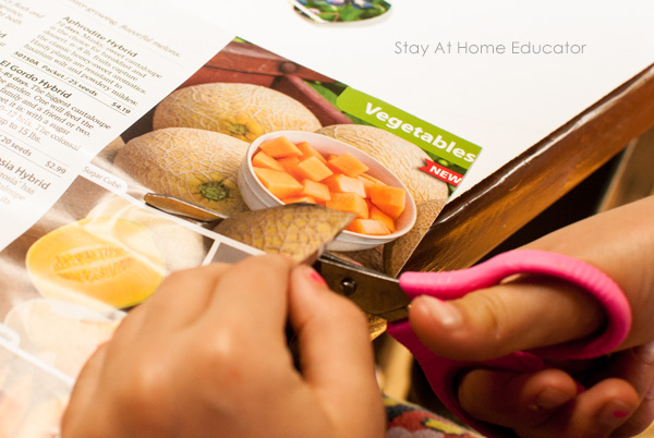 Cutting magazines as part of preschool healthy food activities