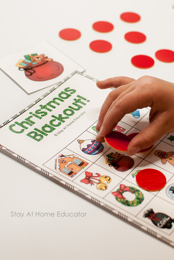 Playing Christmas blackout - free Christmas printable for preschoolers