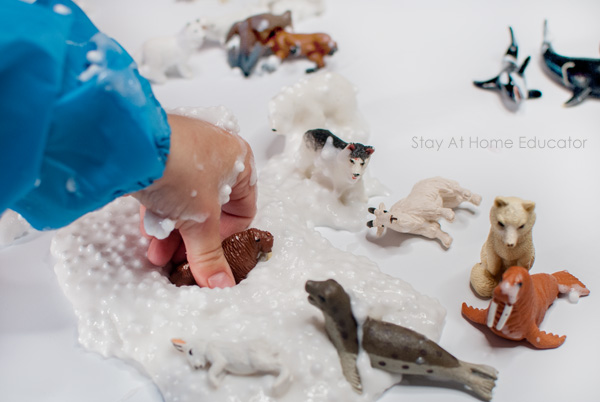 preschool arctic animal activity with slime and arctic toys