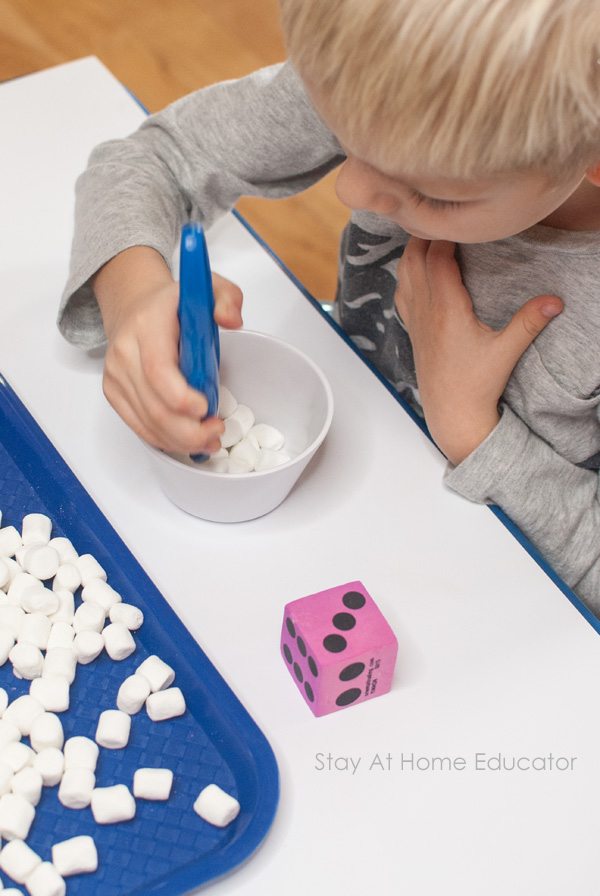 winter counting activities with mini marshmallows and foam dice