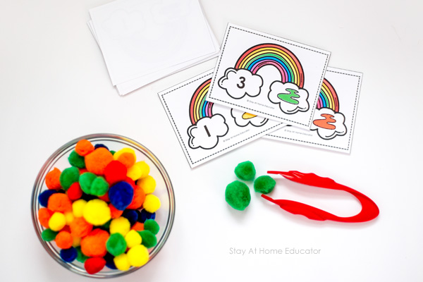 pompoms, tweezers, and free printable for rainbow themed math activities