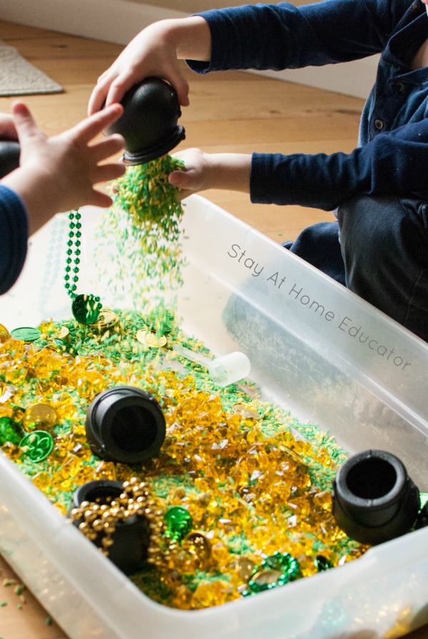 children exploring St. Patrick's Day sensory bin
