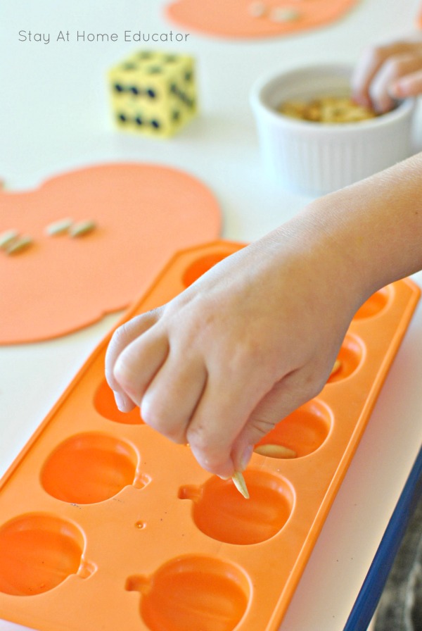 A Pumpkin Seed counting activity series. These activities are perfect for your preschoolers during fall or pumpkin week. A math activity for preschoolers that also helps strengthen fine motor skills! #preschoolteacher #pumpkinweek #fallactivitiesforkids #finemotorskills