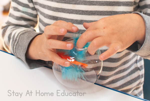 A fine motor activity for kids that can turn into a keepsake ornament for kids. 