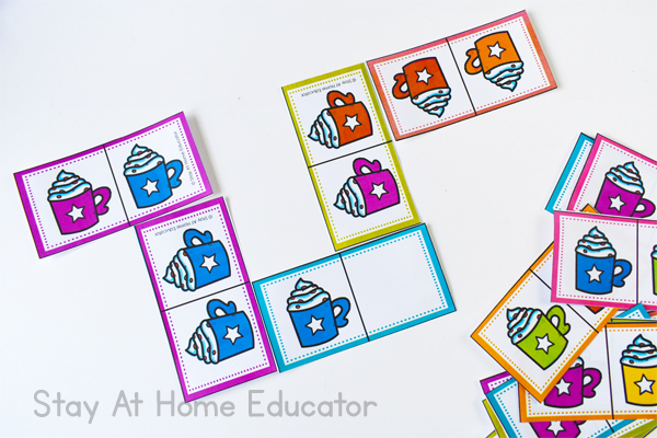 A fun set of Hot Cocoa Activities including a fun printable dominoes game perfect for preschoolers. This activity helps with sorting and comparison! #preschoolprintable #freeprintablegame #simplemath #preschoolteacher