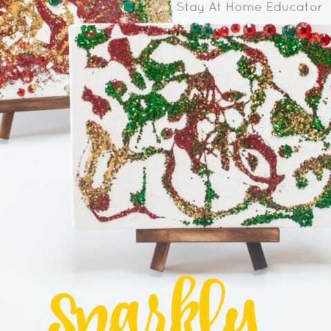 Christmas process art for preschoolers | sparkly Christmas paintings using glitter, glue, and gemstones.