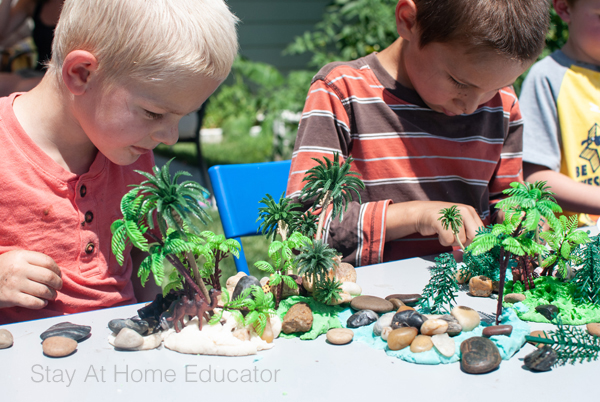 preschoolers playing in playdough invitation to play for Earth Day activity