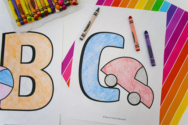 letter b alphabet coloring page and letter c alphabet coloring page with car and a set of crayons