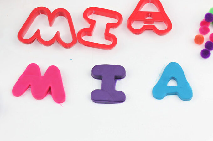 the name Mia spelled with playdough for preschool name recognition activity