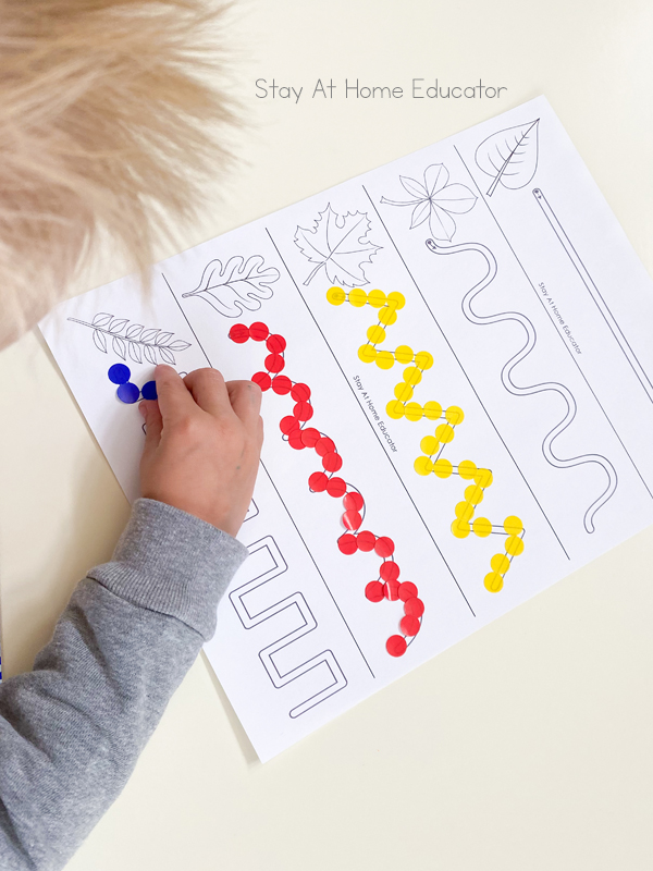 pre writing activities | prewriting worksheets | prewriting strokes | activities to teach preschool writing | preschool fall theme | fall leaves preschool activities | tracing sheet filled with stickers