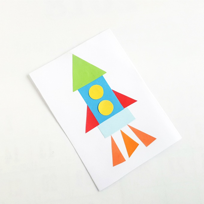a rocket ship made out of shapes is a shape collage, a fun way to teach shapes to preschoolers