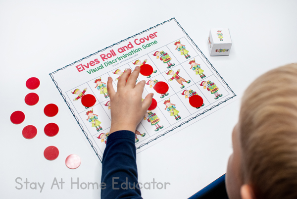 visual discrimination mats, Christmas visual discrimination games for preschoolers | using bingo markers, children cover the matching elf figure |