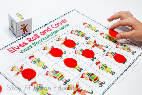 close-up of elf roll and cover game for preschoolers | Christmas visual discrimination mats | visual discrimination games for preschoolers
