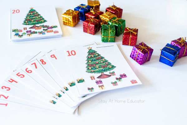Free Christmas counting cards image| image shows Christmas tree counting cards 1-10, plus one card with 20| image also has mini gift manipulatives|