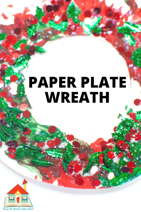 Christmas wreath art | paper plate wreath with red and green tissue paper and glitter.