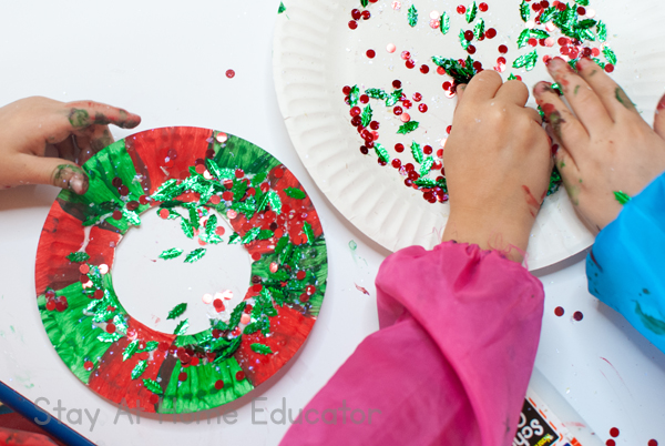 Christmas wreath art | Christmas art for preschoolers | adding confetti and glitter to Christmas wreath art | 