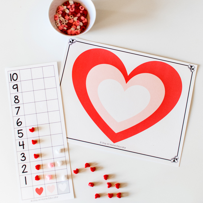 printable counting and graphing activities for preschoolers for friendship theme or Valentine's Day - Drop the buttons and graph the colors!