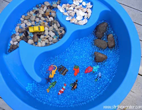 ocean theme sensory bin has many sensory play benefits