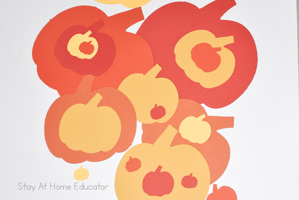 a display of finished pumpkin crafts for preschoolers