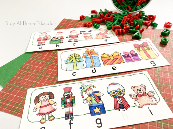 free printable Christmas alphabetical order cards and red and green alphabet letters in a Christmas literacy center