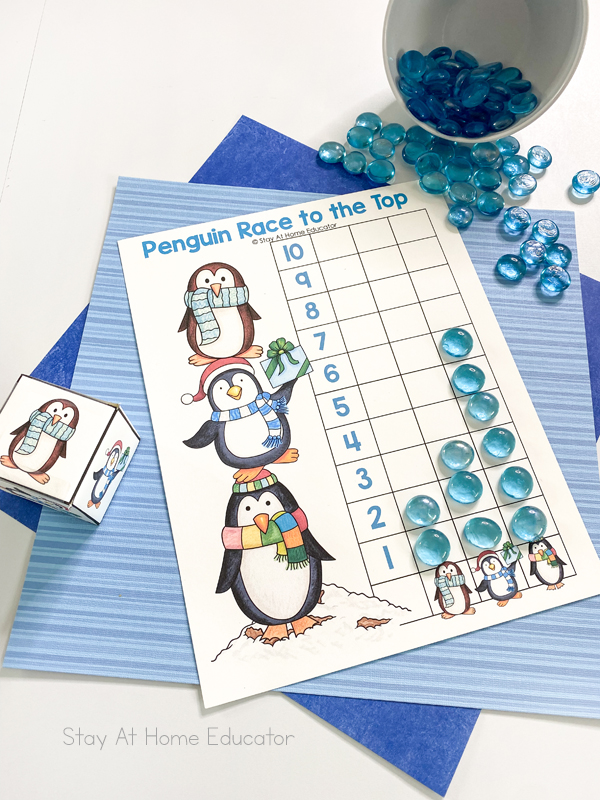 one penguin has two, one has three, and one has six on a penguin graphing idea for kindergarten