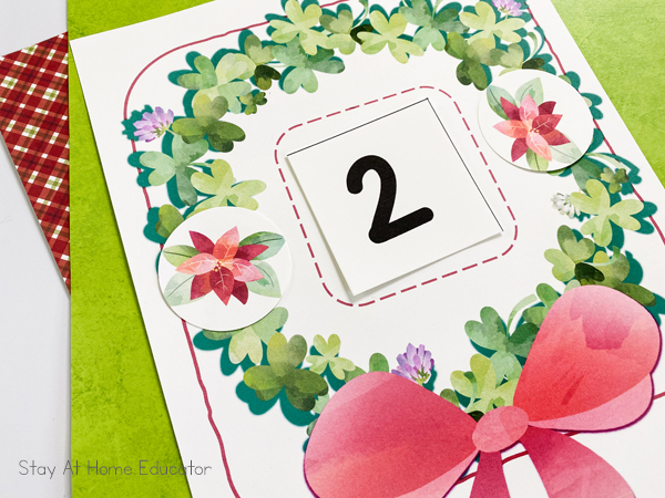 counting mat for preschool | Number 2 with two Christmas poinsettas | Christmas addition |