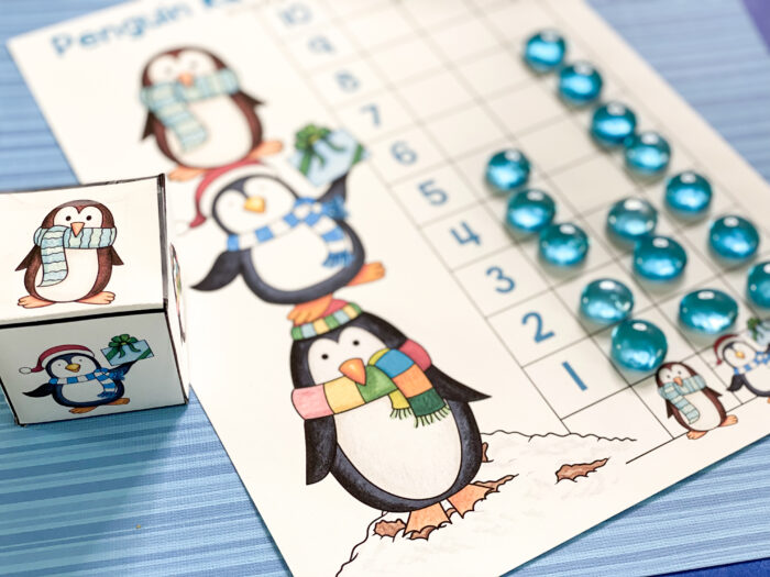preschool penguin activities being played as a roll and graph game