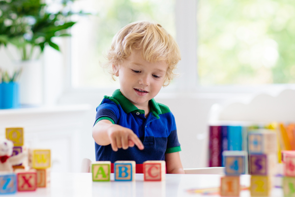 Children need frequent exposure to letters through hands-on alphabet games and activities when learning letter recognition.